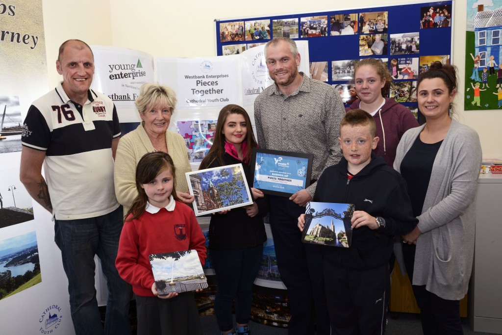 John Peto (Nerve Centre) presenting the Young Enterprise award to the Northern Ireland Quickpitch Runners up.