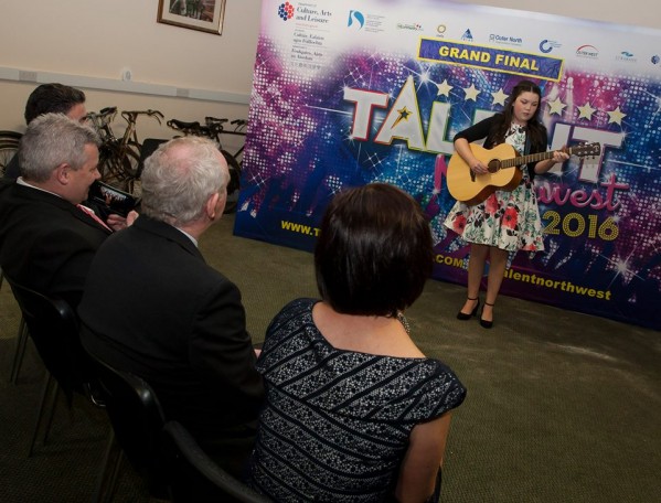 Amy Meehan performing for deputy first minister Martin McGuinness